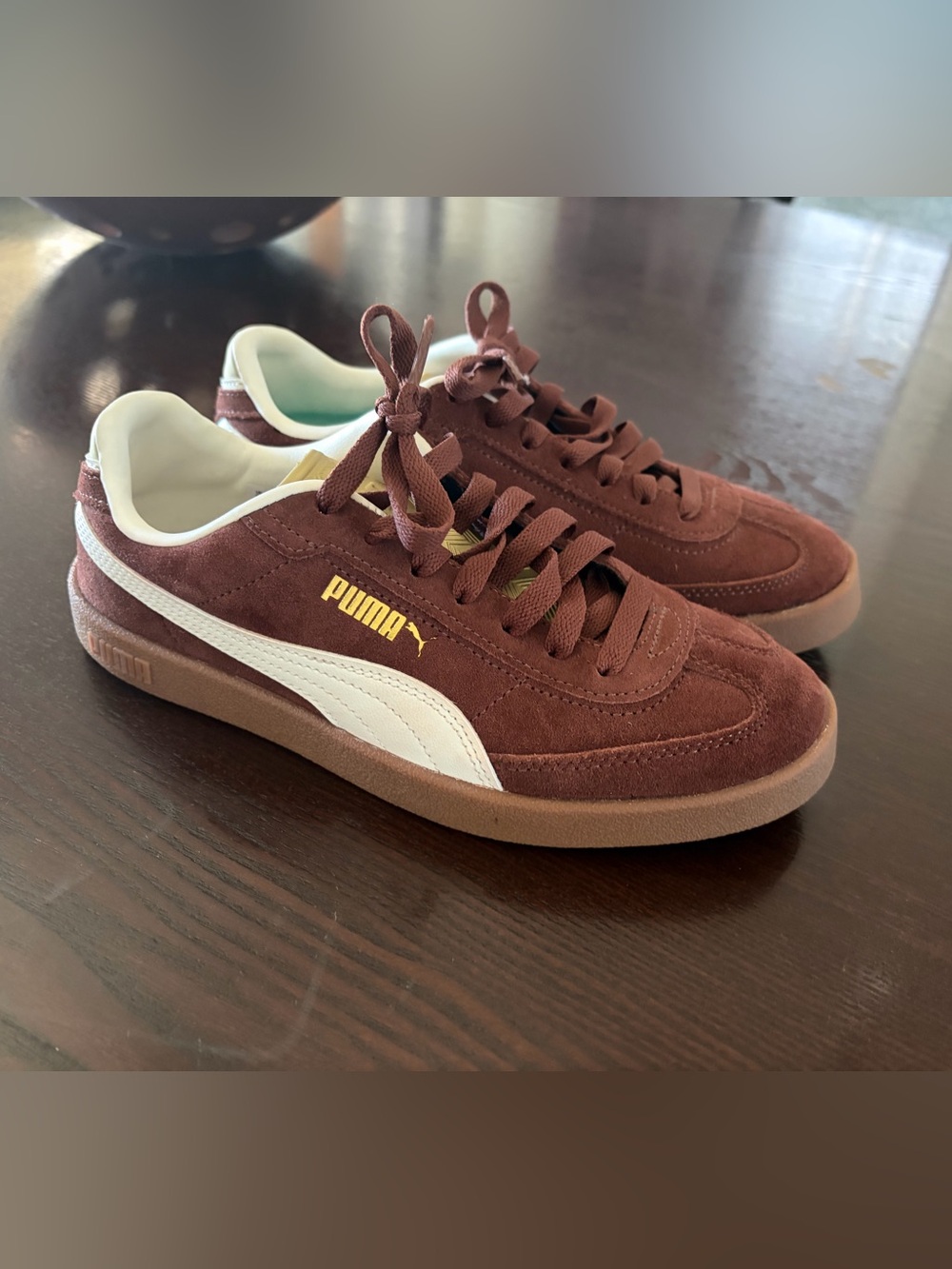 Puma Suede Sneakers in Brown with White Stripe and Gold Logo